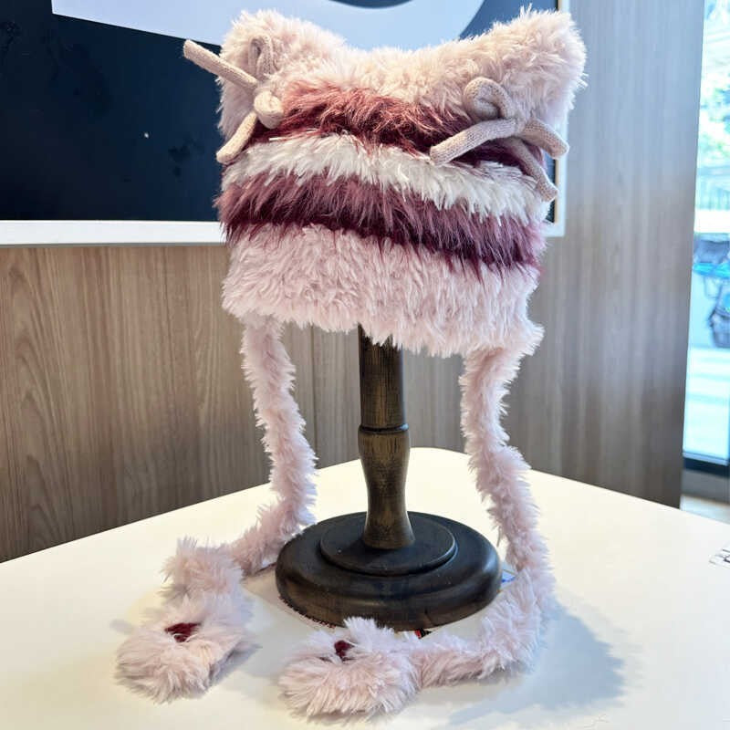 Evira Plush Bow Earmuff Hat